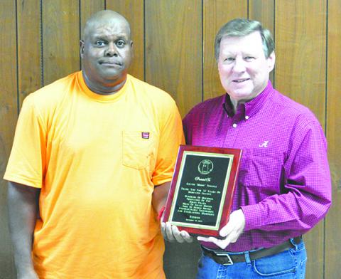 Kelvin Terrell, left, retires after 37 years with the City of Guin. Right is Mayor Phil Segraves.