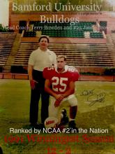 On the right, Samford University Head Coach Terry Bowden is shown with #25 Jamie Brown, about 1991.