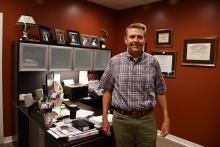 Wayne Cobb Jr., O.D. is shown in his office the week before his 30th year anniversary.