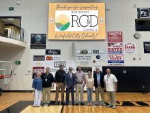 Left to right are Hilda Smith, Chris Carothers, State Senator Garlan Gudger, State Representative Tracy Estes, County Commissioner Larry Akers, Northwest Alabama RC&D Council Executive Director Lauranne James, Winfield Board of Education Chairman James Garner and Winfield Head Girls’ Basketball Coach Brad Cunningham. 