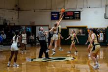 Winfield’s Kennah Beth Lacy jumps for the opening tip-off at Gordo. Photo by Fallon Boman.