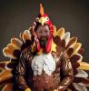 JR Guest Columnist Russell Estes wears an A.I. turkey costume in honor of the special column he wrote for his hometown paper’s Thanksgiving issue.